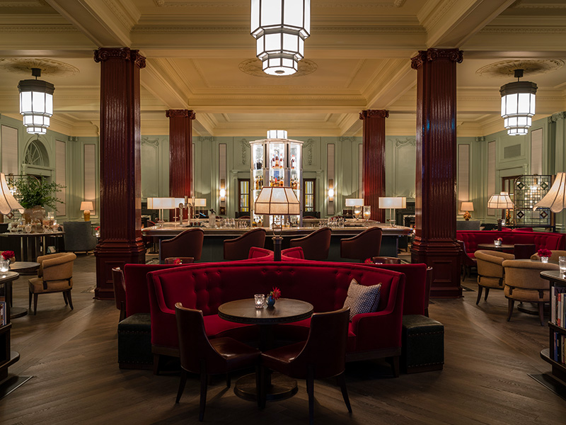 Large bar with comfortable lounge seating and dim lighting